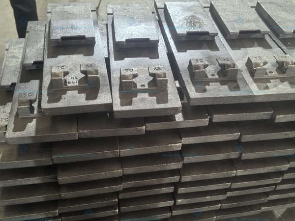 Batch of cast slide baseplates before final surface finishing